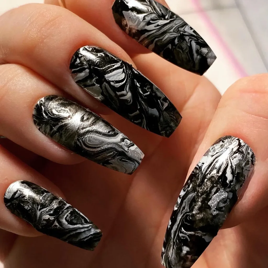 23. Black Tie-Dye Nails