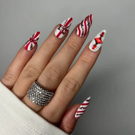 3. Glitter Candy Cane Accent Nails